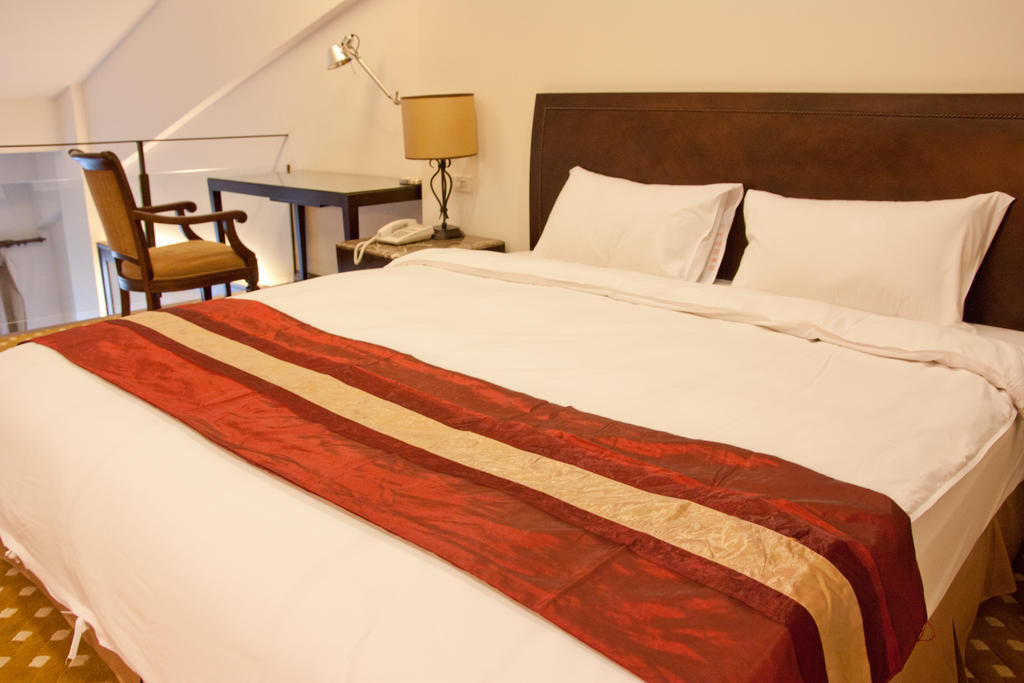 Les Hotel טאינאן חדר תמונה
