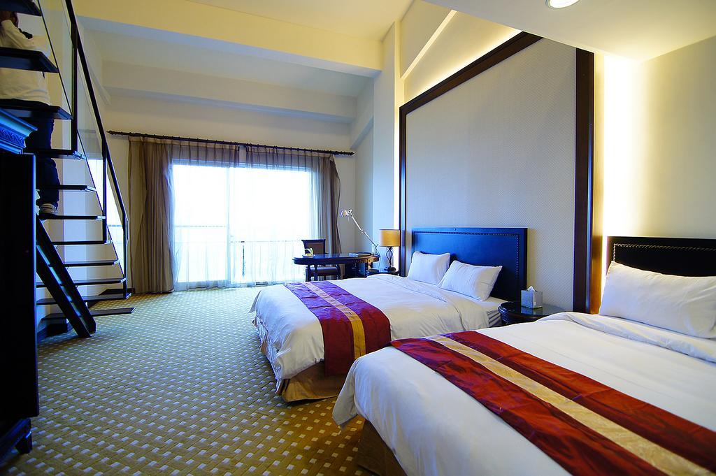 Les Hotel טאינאן חדר תמונה